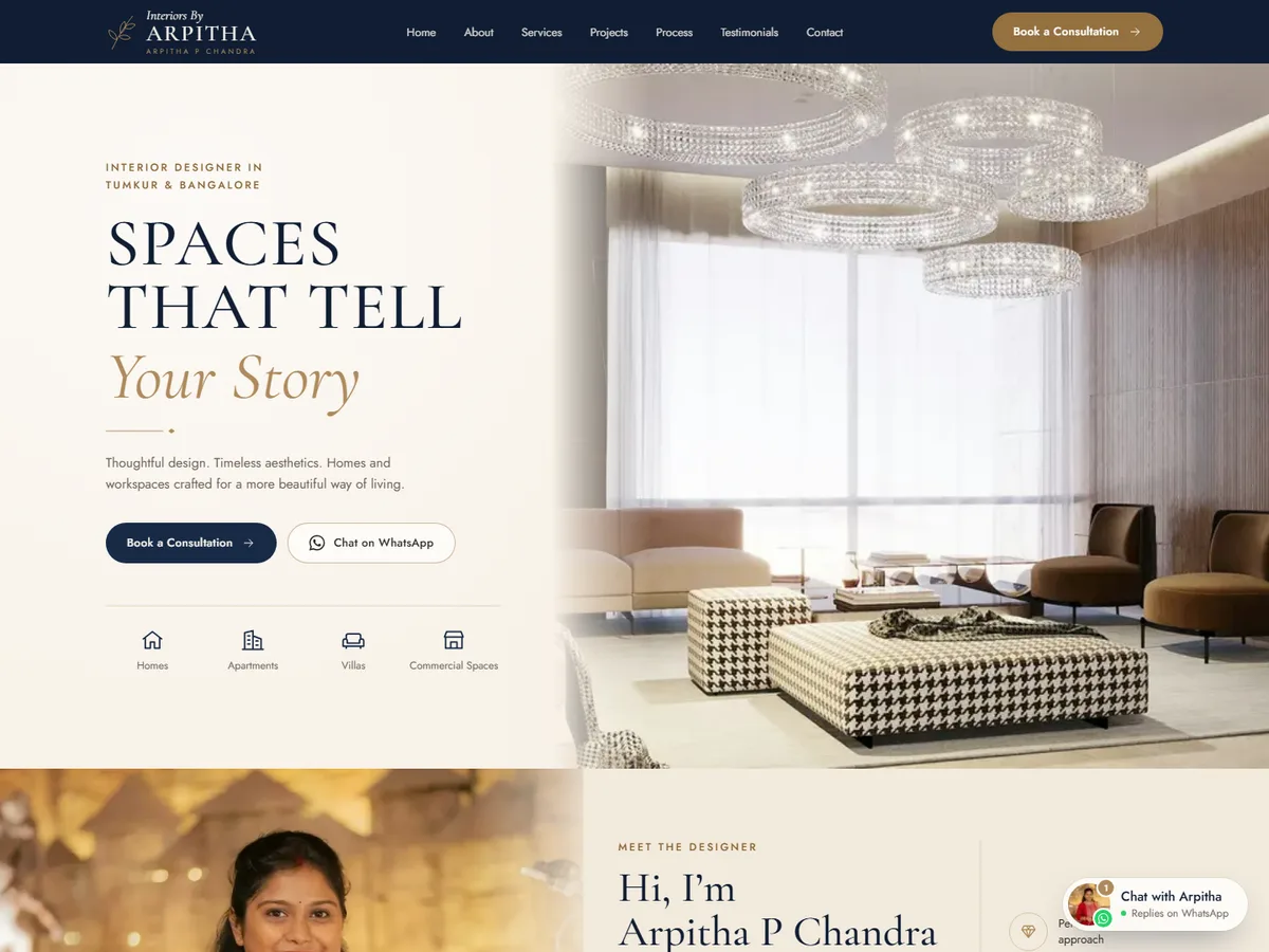 Interiors By Arpitha homepage: “Spaces That Tell Your Story” beside an elegant living room with crystal chandeliers